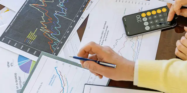 Reviewing property records and financial documents for a lien search